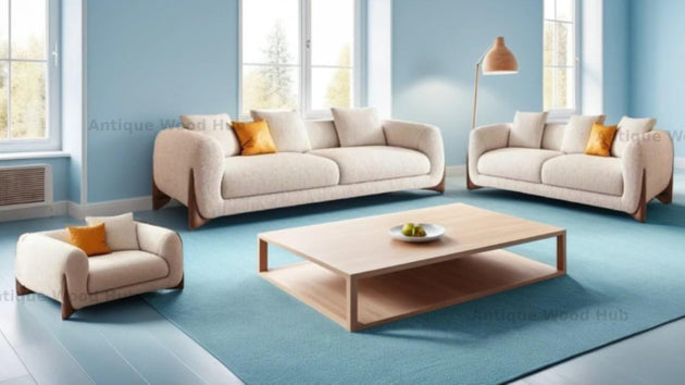 Living room with beige sofas, a wooden coffee table, and decorative pillows on a blue carpet.