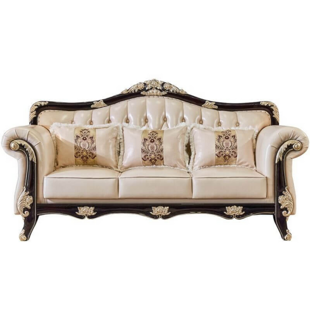 Decorative sofa with ornate armrests and backrest on a white background
