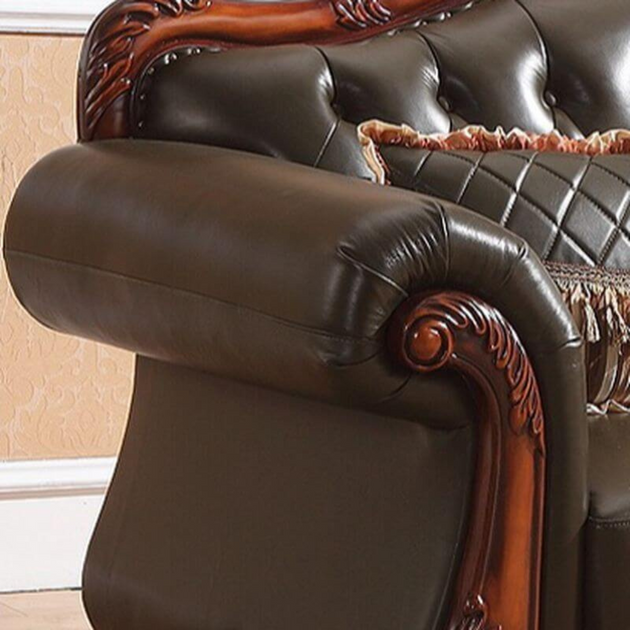 Brown leather armchair with intricate wood carvings in a room setting.