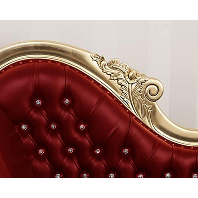 Red tufted headboard with gold frame and decorative elements on a white background