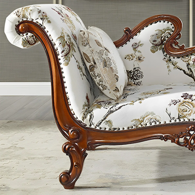 Decorative sofa with floral pattern and wooden frame in a room setting